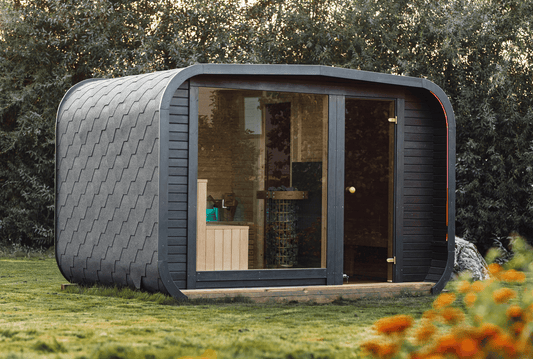 The Sanctuary outdoor sauna exterior showing the thermowood cladding and glass front