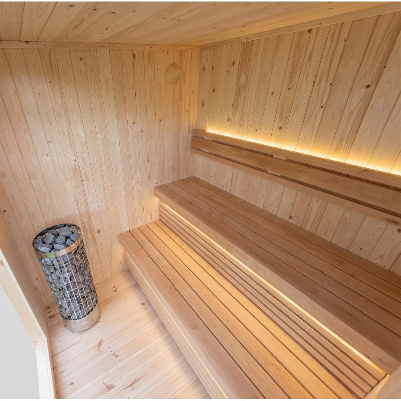The Outpost outdoor sauna interior with 2-tier Linden wood benches