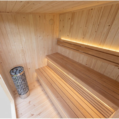 The Outpost outdoor sauna interior with 2-tier Linden wood benches