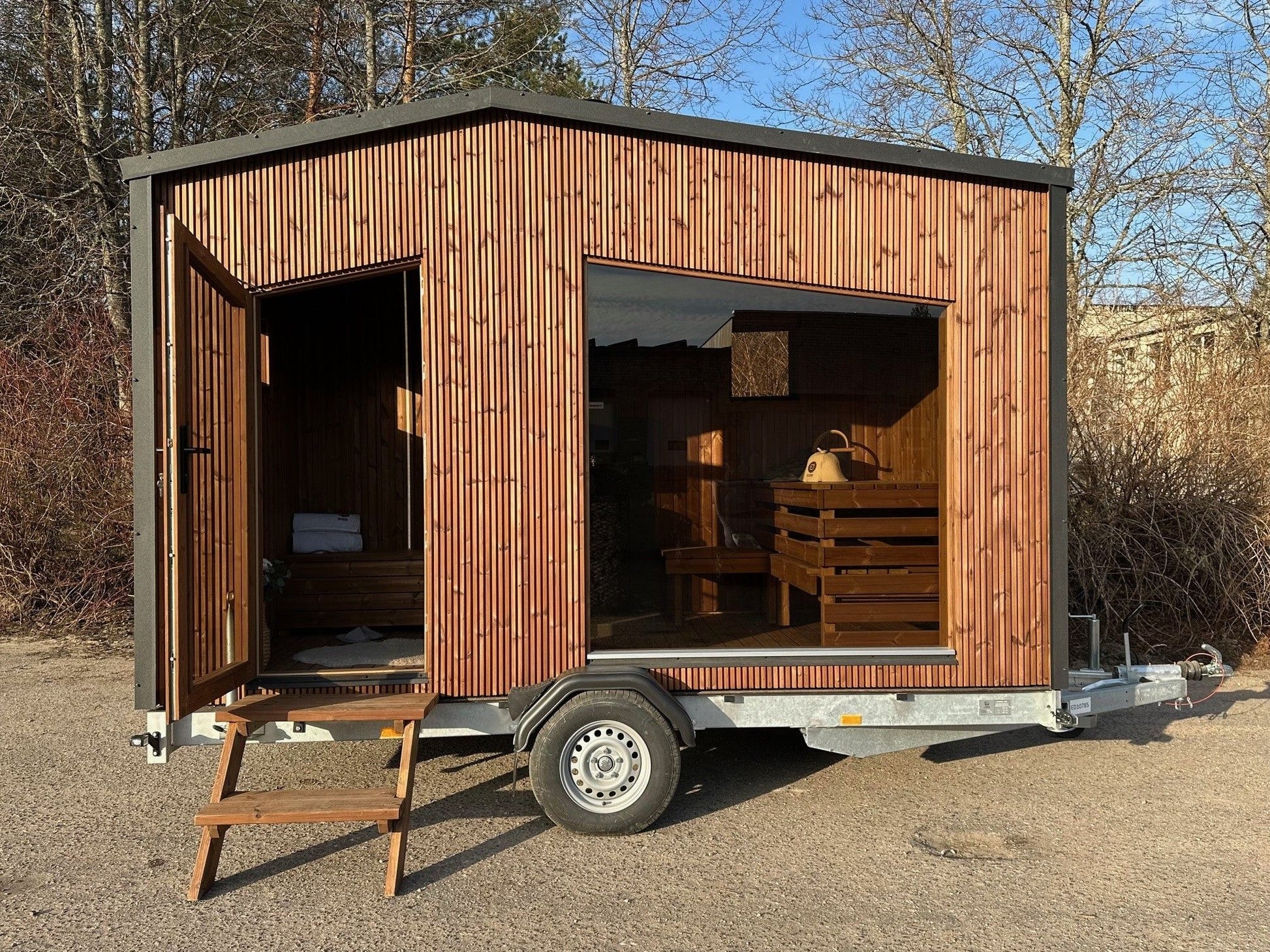 The Nomad mobile sauna and trailer with fold-out wooden steps