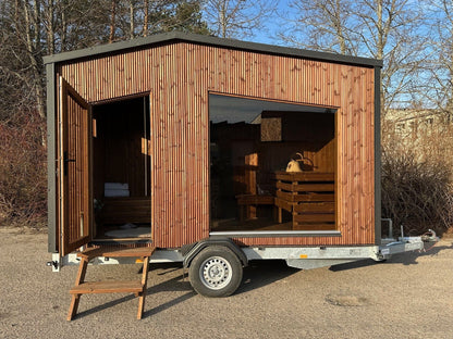 The Nomad mobile sauna and trailer with fold-out wooden steps