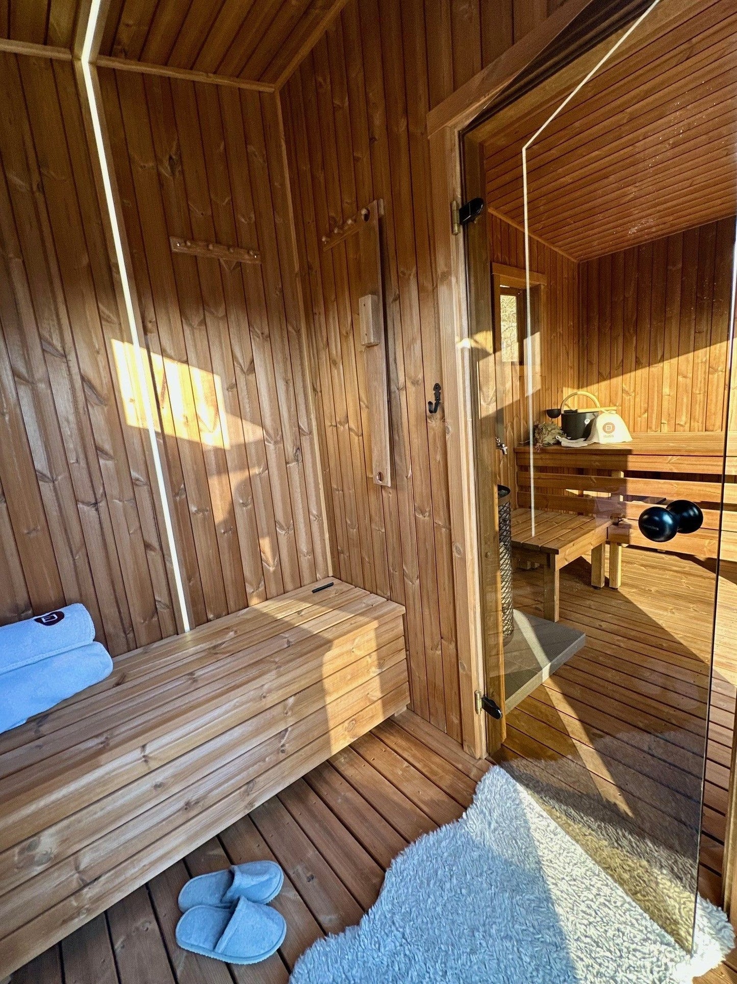 The Nomad mobile sauna wood-burning stove with an external firebox