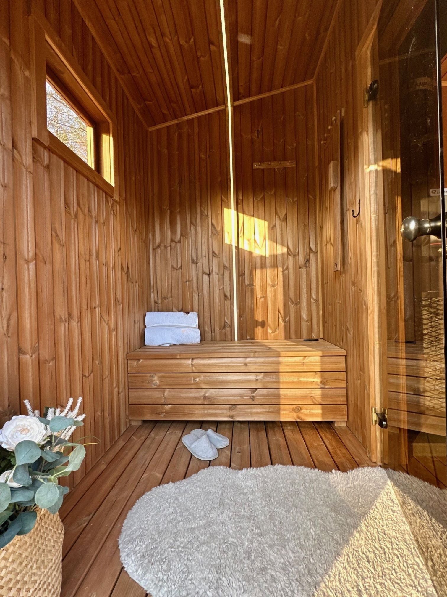 The Nomad sauna interior with thermo-wood benches and backrests