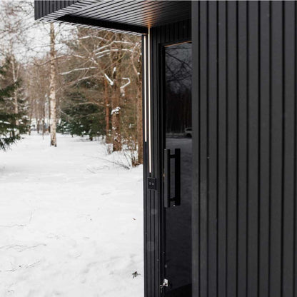 EBON sauna heater and stones in the thermo black alder interior