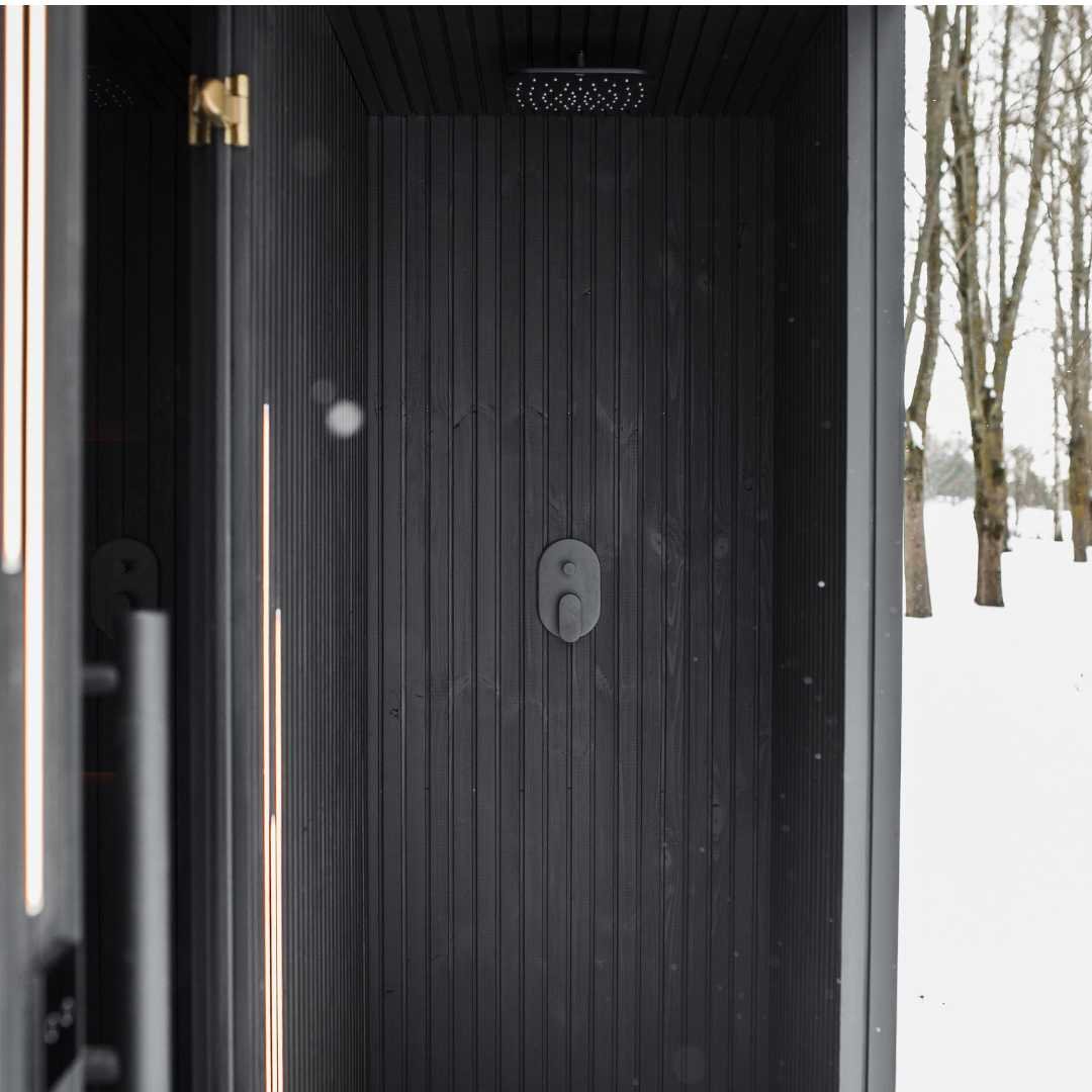 EBON insulated outdoor sauna in a garden setting