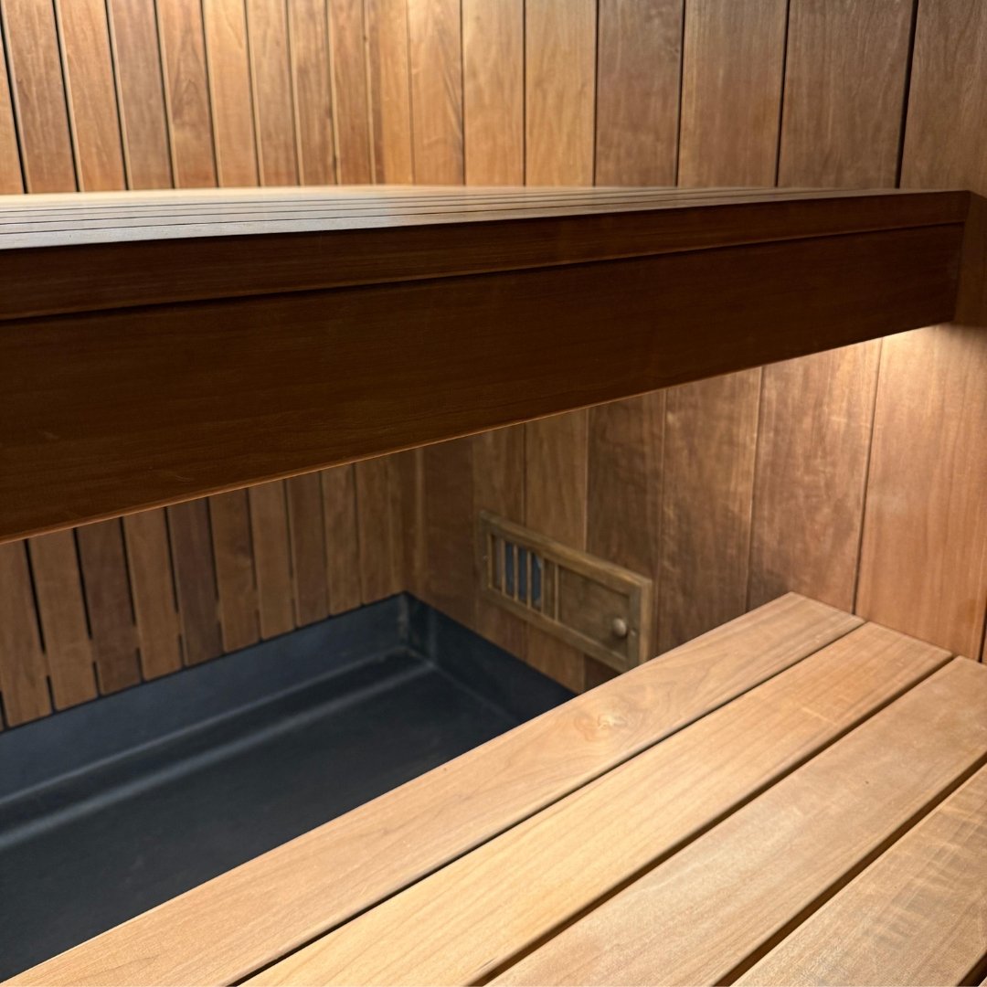 EBON insulated frame sauna exterior with black glass door and window