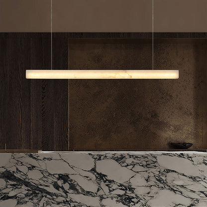 Long alabaster-effect diffuser pendant warm glow detail
