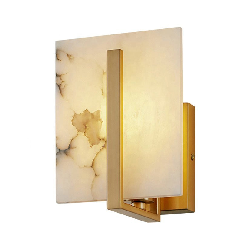 Alabaster wall sconce gold brass wide form warm interior