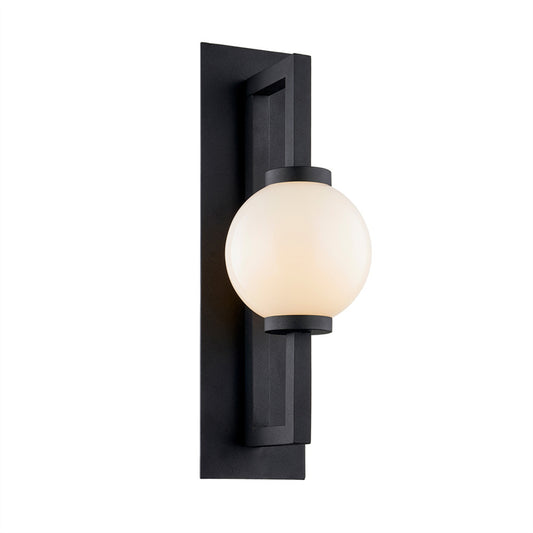 Aluminium orb wall lamp with white jade glass diffuser mounted by entrance