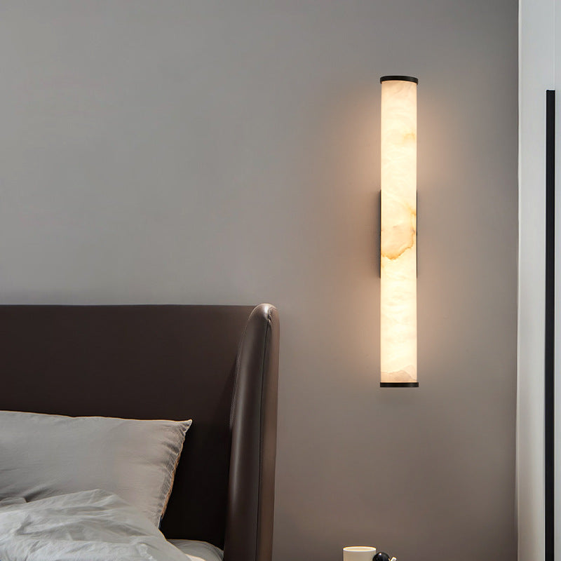 Copper and stone linear recessed wall light in modern interior
