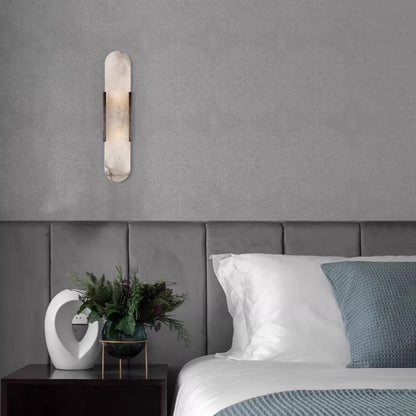 Alabaster block wall sconce lit warm white