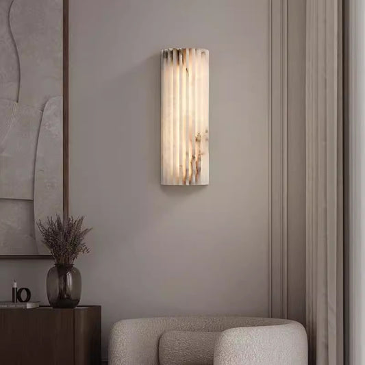 Ribbed alabaster cylindrical wall light warm white glow