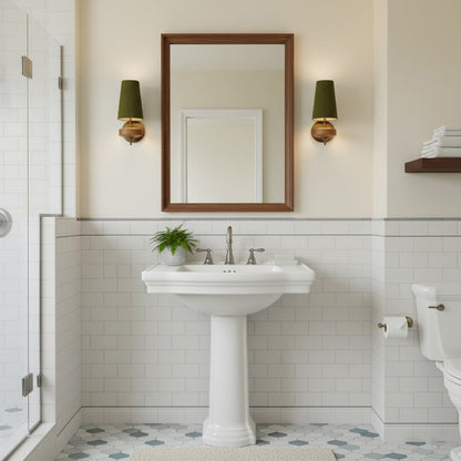 Walnut and brass wall sconce in forest green linen
