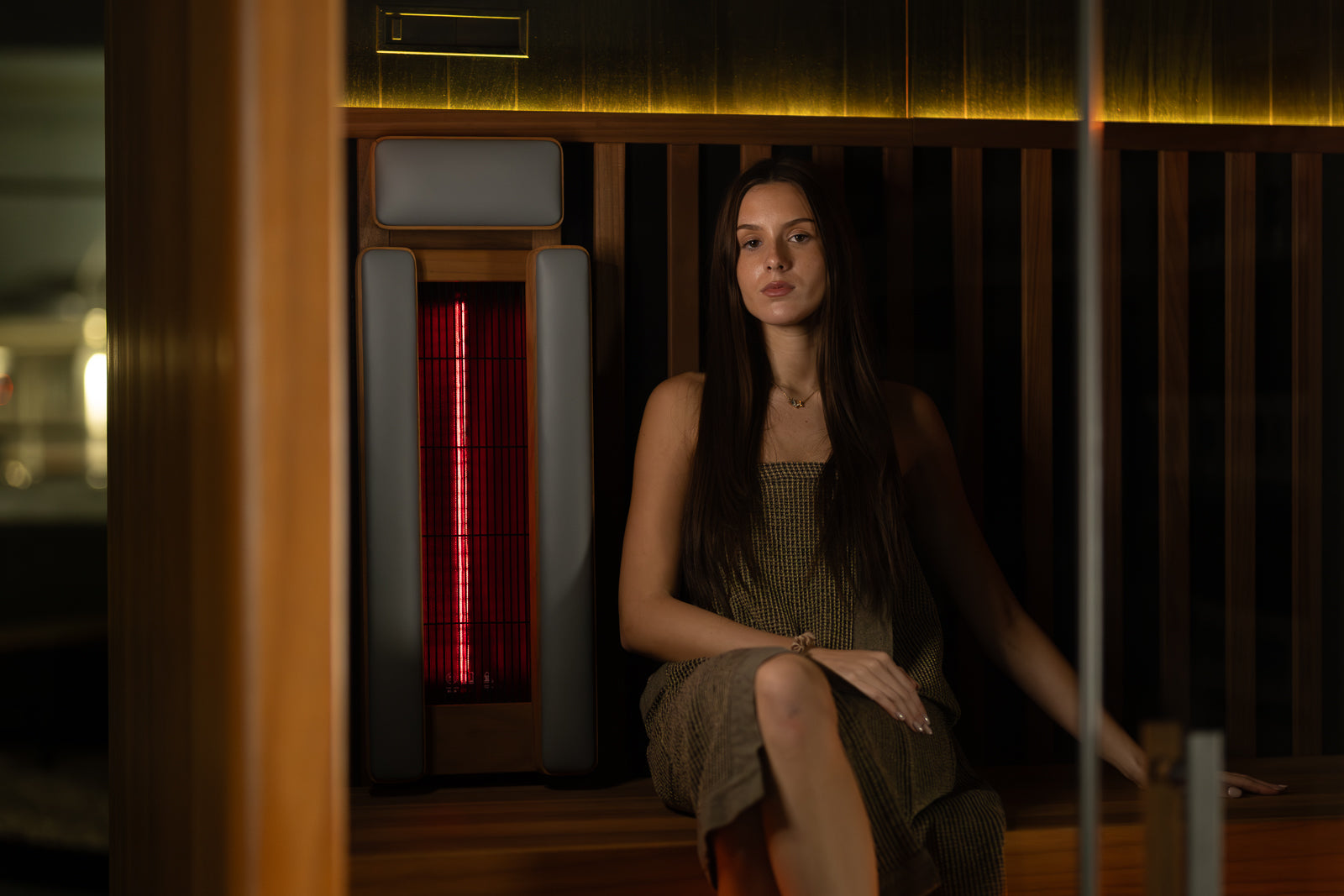 OKA Fusion Synergy 3 hybrid sauna in a modern interior setting with star ceiling lighting