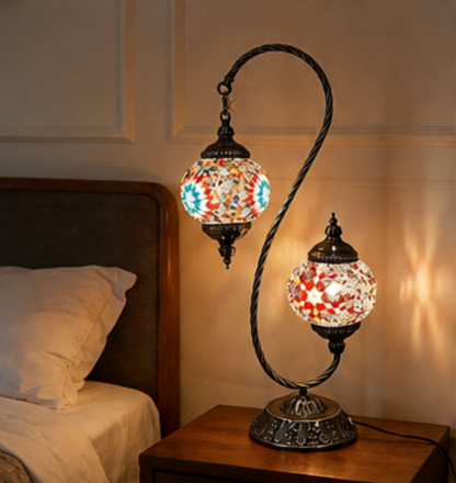 Gemelli double-head Turkish mosaic table lamp shown lit, with warm light through the twin coloured glass shades
