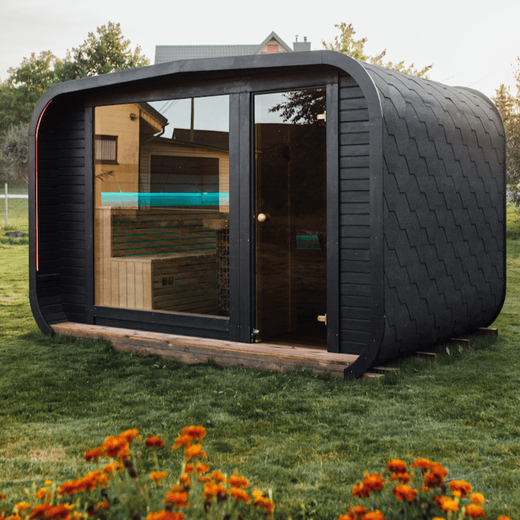 The Sanctuary outdoor Finnish sauna in thermowood with tempered glass door