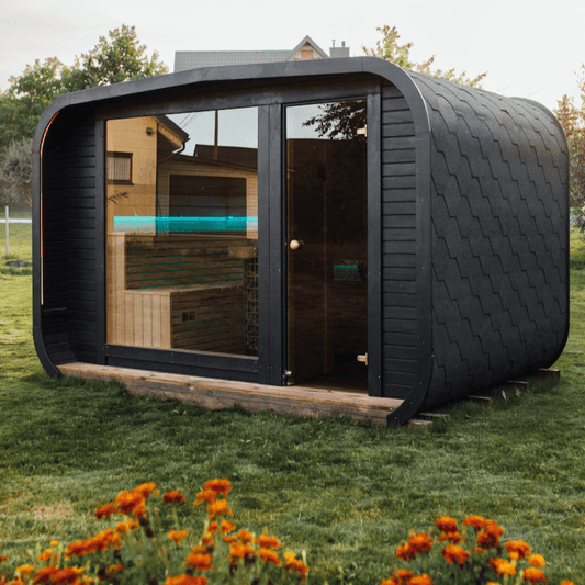 The Sanctuary outdoor Finnish sauna in thermowood with tempered glass door