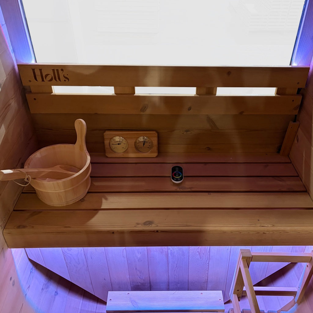 Vulkano Black 4.5kW sauna heater with stones, included with the Holl's Cocoon