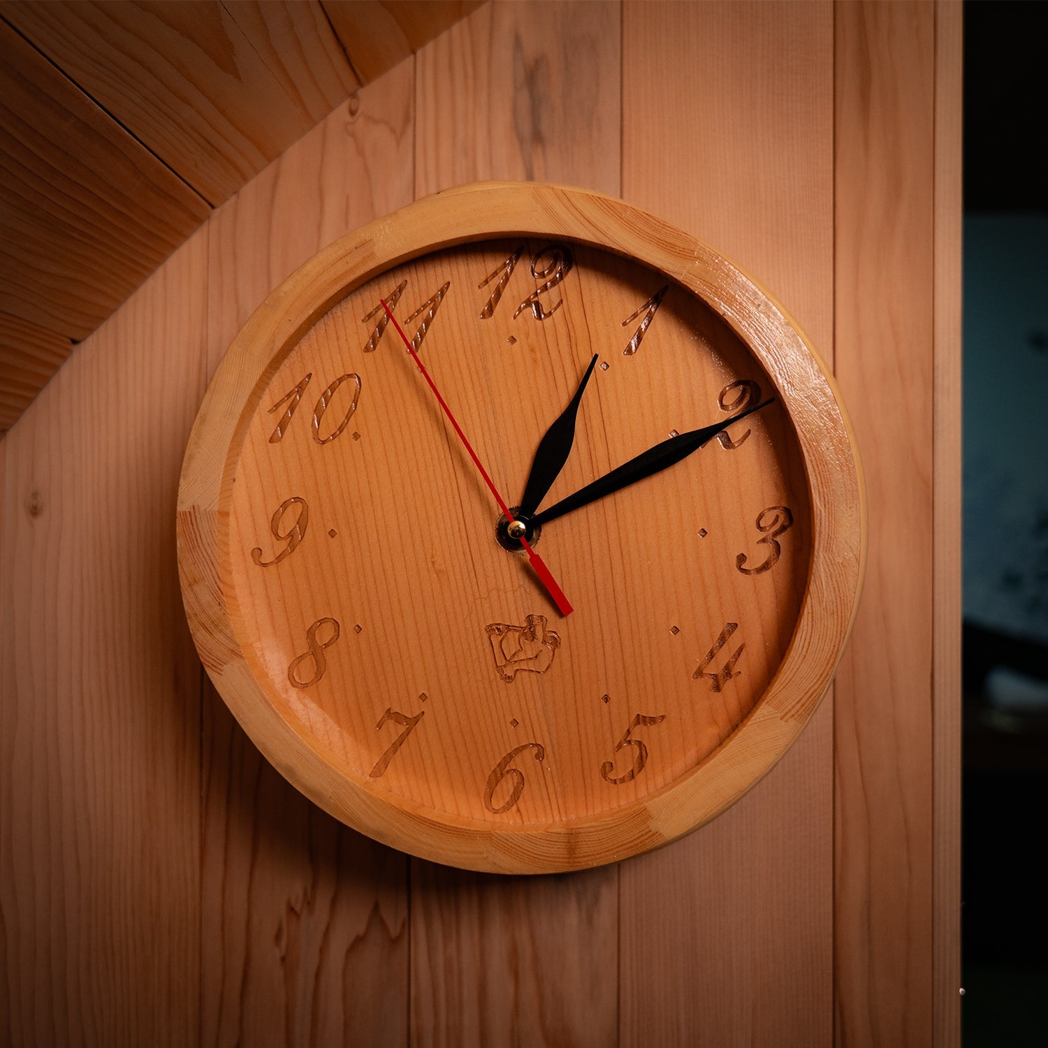 Sauna clock included with the Insignia Hybrid Barrel Sauna