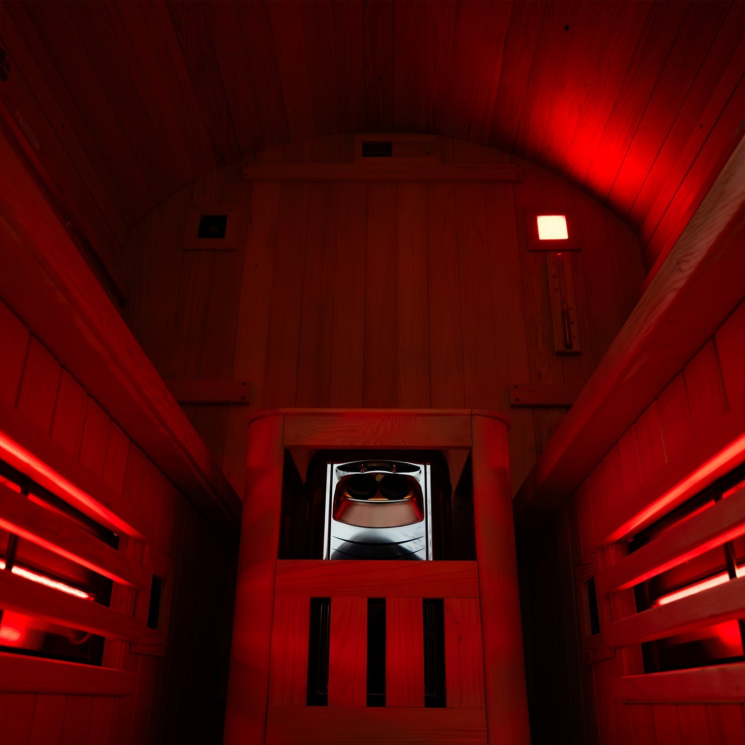 Insignia Hybrid Barrel Sauna interior with red glass infrared panels and Harvia stove