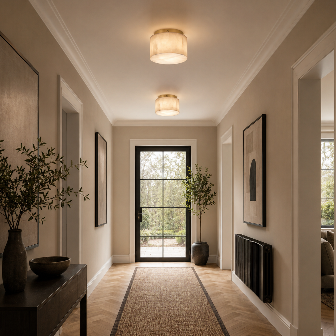 Modern hallway with decorative elements and a glass door leading outside.