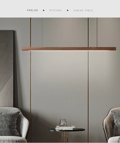 Walnut 120cm linear pendant above marble kitchen island, warm lighting