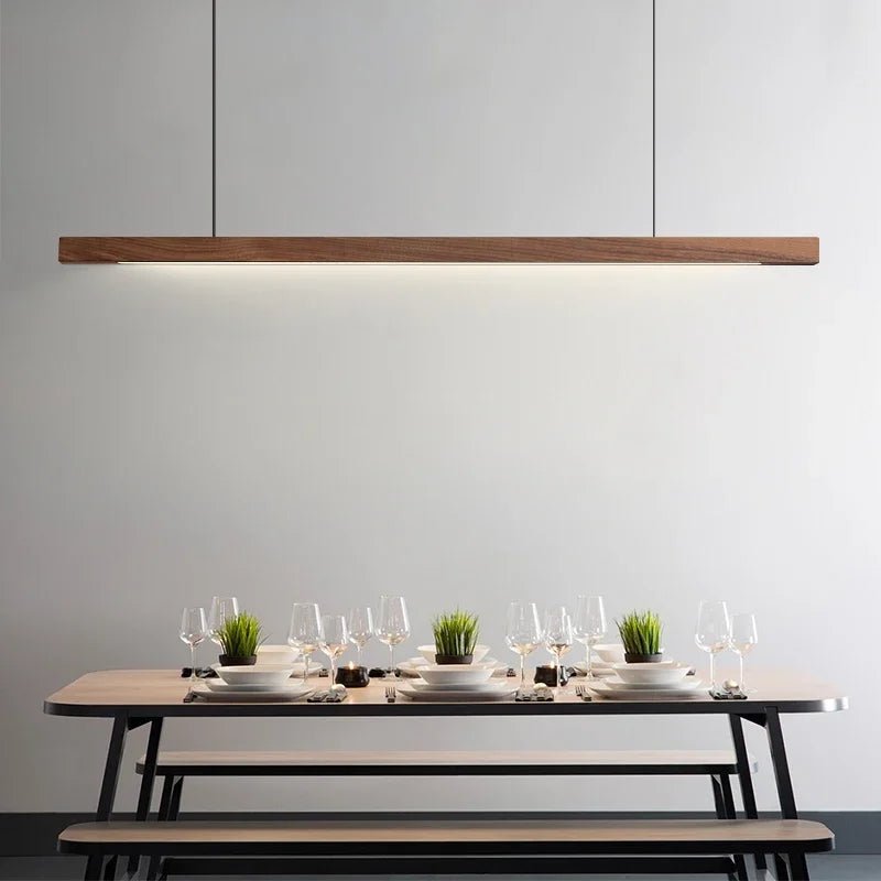 Close-up of integrated LED strip inside pine linear pendant body