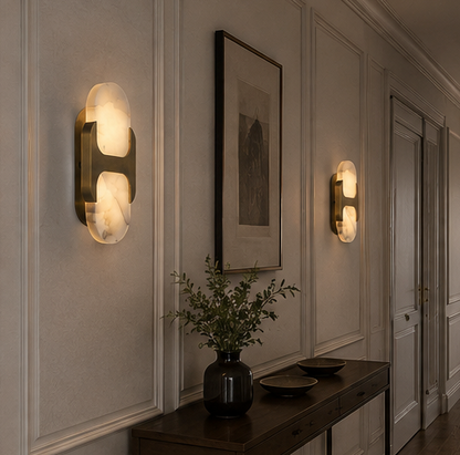 Oval alabaster wall light mounted on a stairwell wall