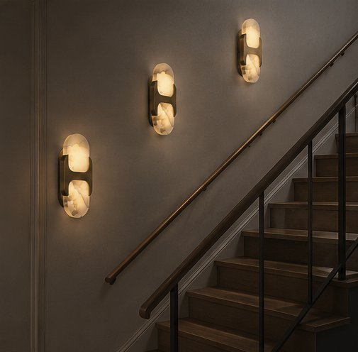 Copper and alabaster wall sconce shown in a modern interior with warm layered lighting