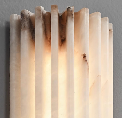 Alabaster wall sconce with remote control showing the selectable colour temperature settings