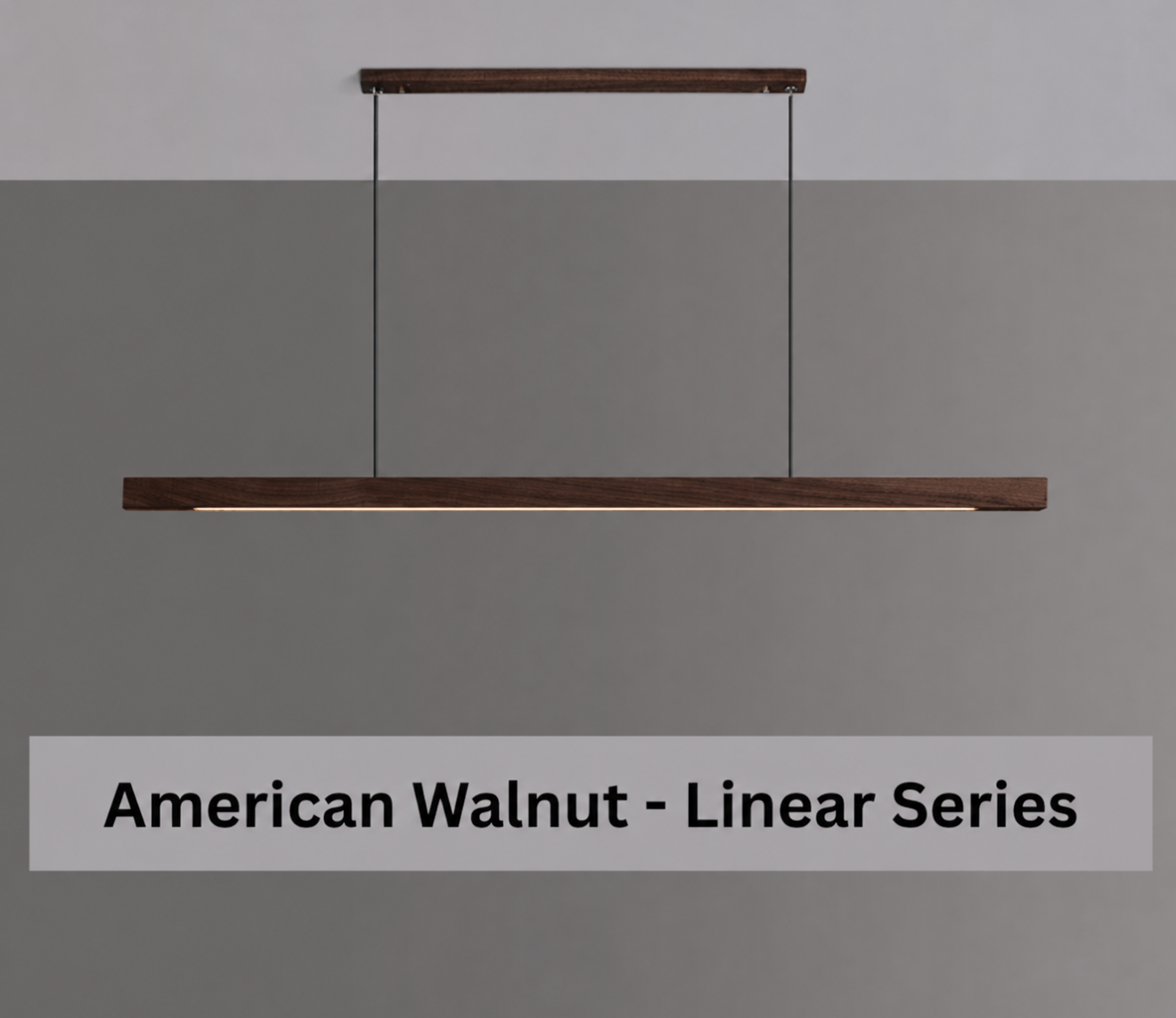A linear pendant light in a dark American Walnut finish, suspended by two black cables from a matching top bar, shown against a split gray and white background with a text overlay at the bottom reading 'American Walnut - Linear Series'.